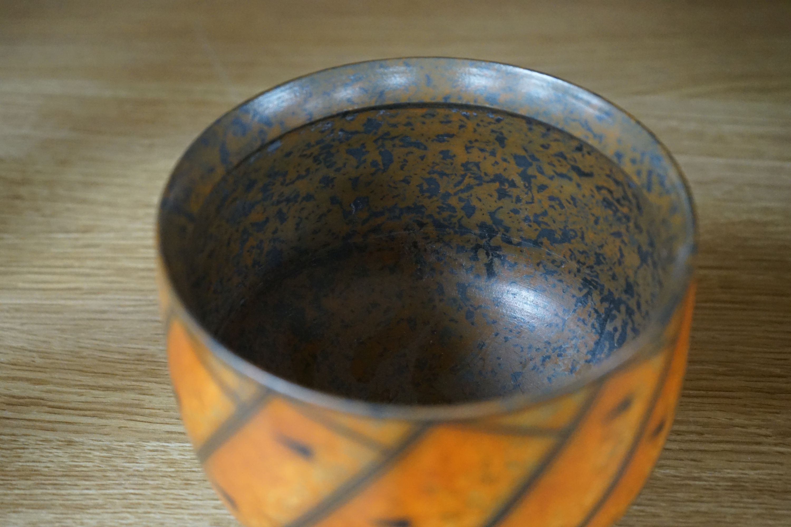 Duncan Ross (b.1943), a burnished terra-sigillata U-shaped vase (small glaze flake to rim) 15cm wide